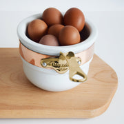Mauviel | M'150 B Copper Tinned Bain Marie shown with brown eggs in a white bowl, highlighting its use for gentle, consistent cooking.