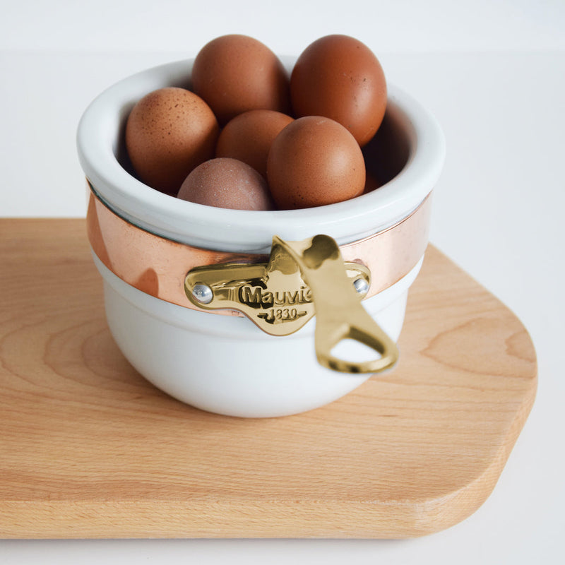 Mauviel | M'150 B Copper Tinned Bain Marie shown with brown eggs in a white bowl, highlighting its use for gentle, consistent cooking.