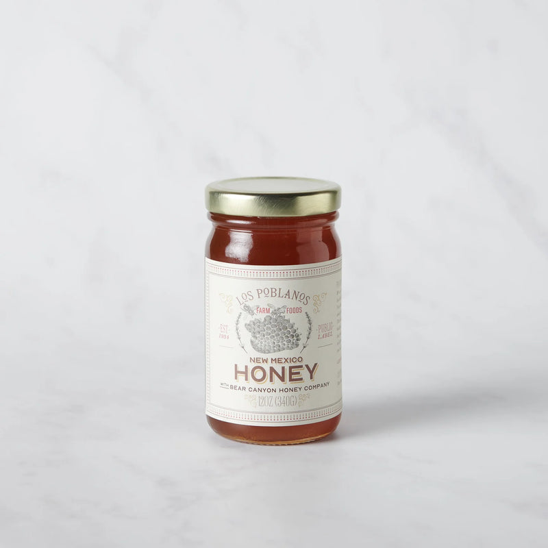 Los Poblanos | New Mexico Honey in a 12 oz glass jar with gold lid, showcasing raw, unfiltered honey sourced from New Mexico's diverse blooms.