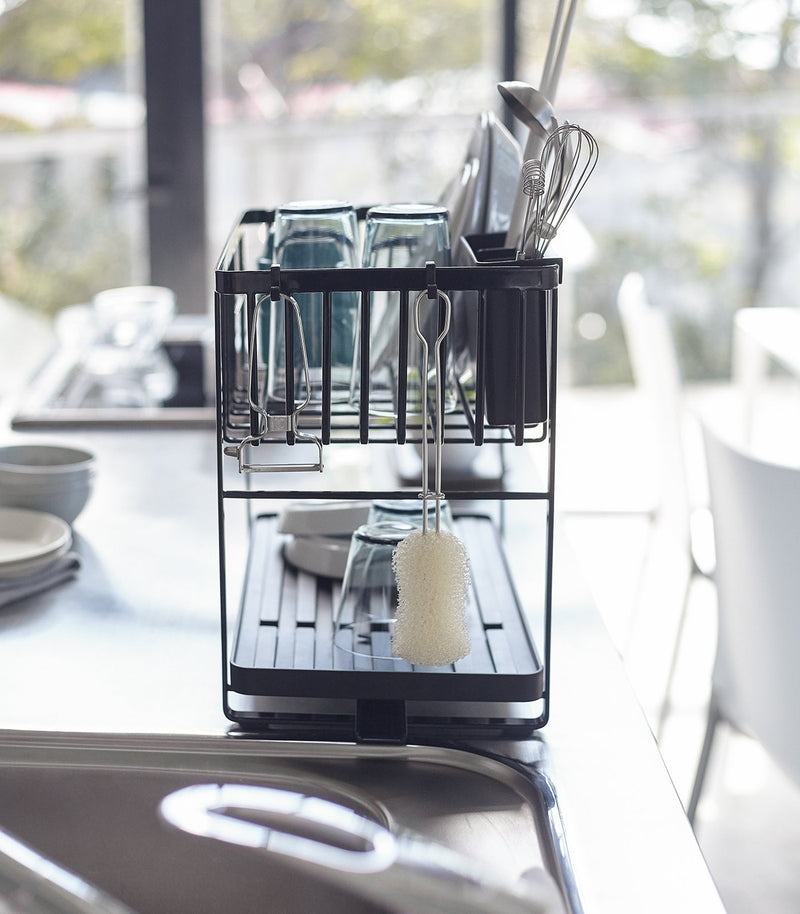 Yamazaki Home | Two-Tier Dish Rack, White: Efficiently air-dry dishes with this steel rack featuring customizable tiers, utensil holder, and 360-degree draining spout for clutter-free countertops.