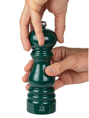 Peugeot | Paris U'Select Forest Green Pepper Mill, 7 inches, in use, showcasing its sleek design and grind control system, crafted from French beechwood.