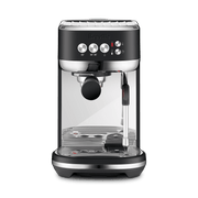 Breville | Bambino Plus espresso maker with portafilter, steam wand, and control panel, offering professional-grade brewing for Athens Cooks' curated kitchen experience.