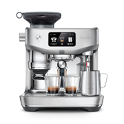 Breville | The Oracle Jet espresso machine with integrated grinder, digital drink selection, dual espresso ports, and milk frothing pitcher, ideal for café-quality brews.