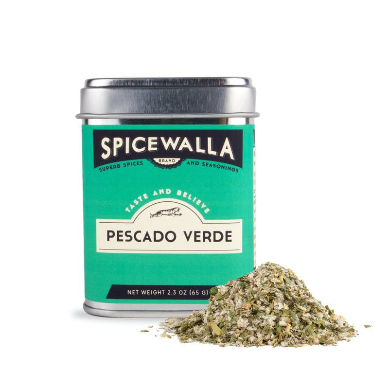 Spicewalla | Pescado Verde seasoning blend tin with a mound of loose, greenish herb-and-spice mix, ideal for enhancing fish dishes with garlicky, citrusy, and herbaceous flavors.
