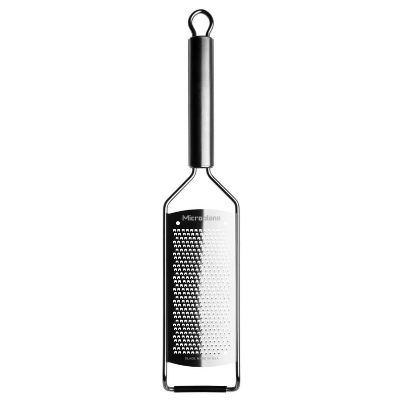 Microplane | Professional Series Extra Coarse Cheese Grater with a stainless-steel frame and non-slip base, ideal for zesting and grating various foods.