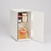 Yamazaki Home Bread Box shown open with jars of Bonne Maman marmalade, Justin’s Honey Peanut Butter, and Parisienne sliced bread, showcasing its storage capability.