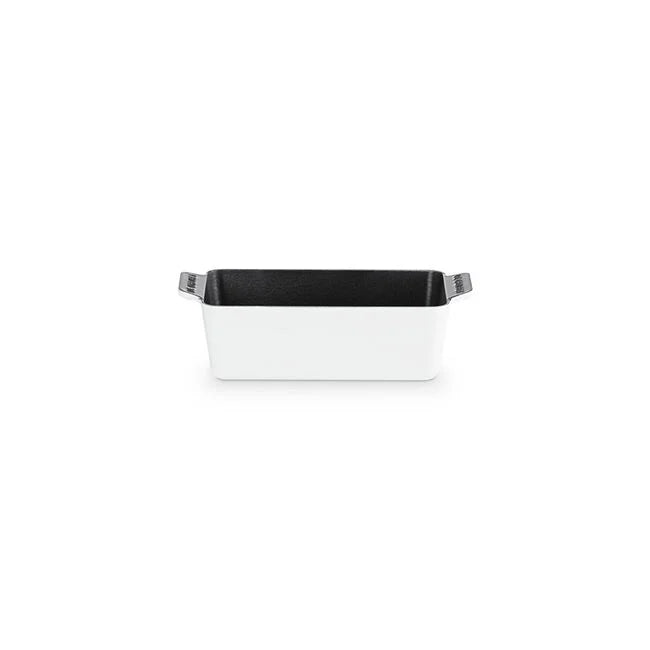Le Creuset Signature Loaf Pan, 9-inch, white, enameled cast iron with ergonomic handles, ideal for baking bread or lasagna, showcasing Athens Cooks' quality bakeware.