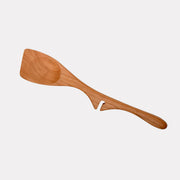 Jonathan's Spoons Spootle features a wooden spatula with built-in bottle opener, blending functionality and elegance, ideal for practical, mess-free cooking.