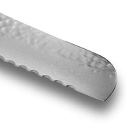 Shun Premier Blonde Bread Knife, 9-inch, showcases a serrated edge and Damascus pattern, ideal for cutting bread without crushing, available at Athens Cooks.