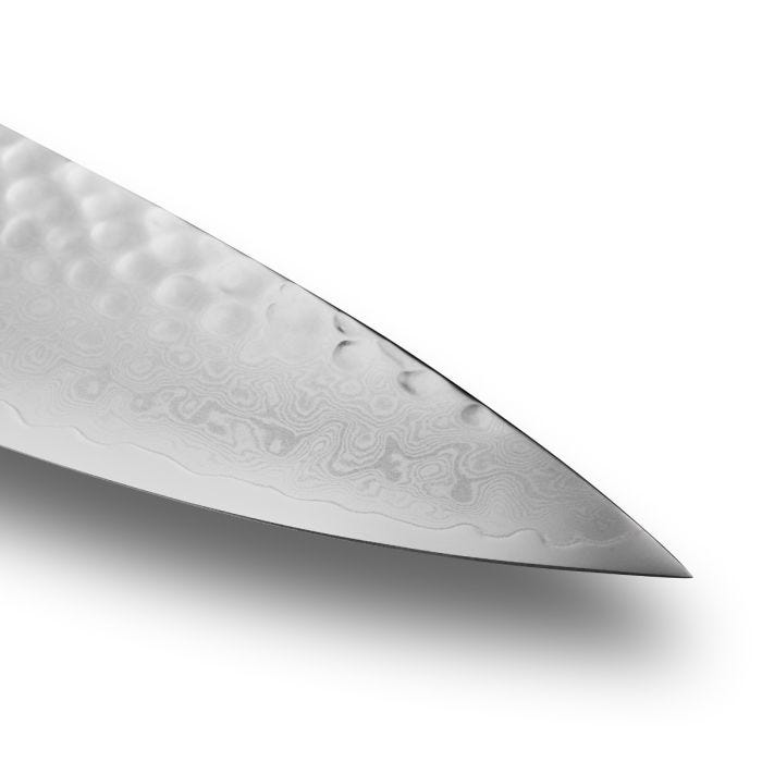 Shun | Premier Blonde Chef's Knife, 8 inches, features a Damascus-style blade with wavy patterns and hammered dimples for reduced food sticking, highlighting its craftsmanship.