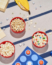 W&P Popcorn Popper Silicone Reusable Maker - Personal Mini Red, collapsible for easy storage, dishwasher-safe, includes a lid-measuring cup, makes 4 cups of popcorn.