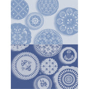 Le Jacquard Français | Faïence Tea Towel displayed with vintage-inspired decorative plates, showcasing intricate patterns, embodying a blend of tradition and eco-conscious design.