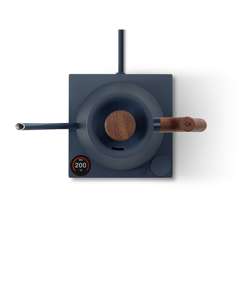 FELLOW | Stagg EKG Pro Electric Kettle with wooden accents on an induction cooktop, displaying 200°F, ideal for precise coffee brewing.