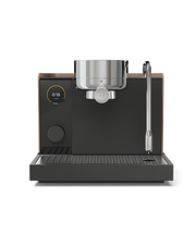 FELLOW | Espresso Series 1, Malted Chocolate + Maple: A sleek, black espresso machine with digital display and steam wand, offering precision and control for home baristas.