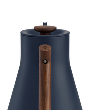 FELLOW | Stagg EKG Pro Electric Kettle, Stone Blue w/ Walnut, featuring a matte body, wooden handle, and knob for precise pour-over coffee brewing.
