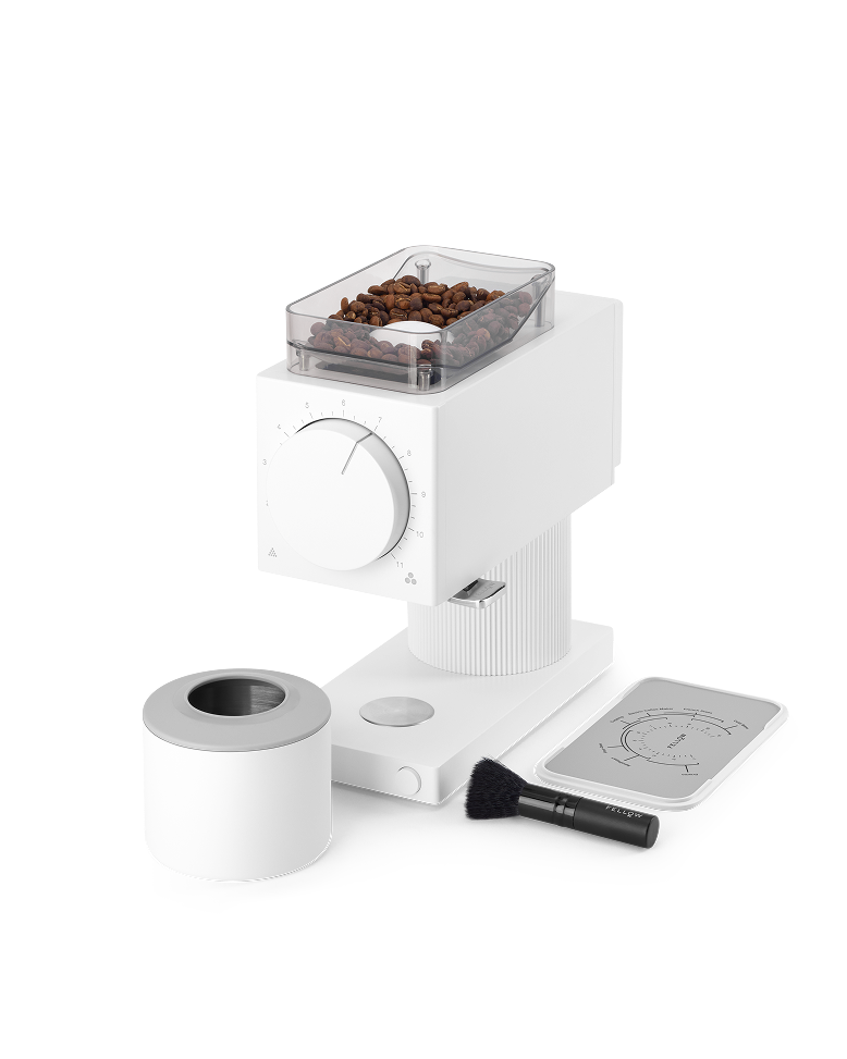 FELLOW | Ode Brew Grinder Gen 2, Matte White with coffee beans in hopper, dosing cup, cleaning brush, and grind guide for precise brewing in kitchen settings.