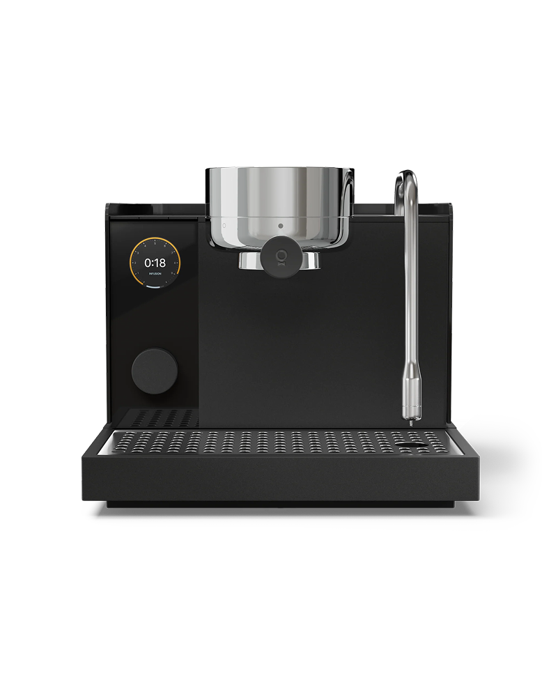 FELLOW | Espresso Series 1, Black, countertop machine with brew group, portafilter, steam-wand, and control knob, offering stable, professional-level espresso performance for home use.