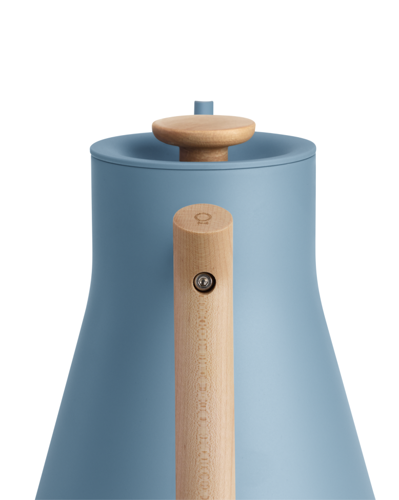 FELLOW | Stagg EKG Pro Electric Kettle, Hazy Blue w/ Maple, showcasing its gooseneck design, natural wood handle, and knob for precise pour-over coffee brewing.