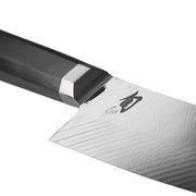 Shun | Dual Core Kiritsuke, 8 inches, showcasing a damascus-style blade, etched kanji logo, and pakkawood handle with bolster, exemplifies craftsmanship and precision.