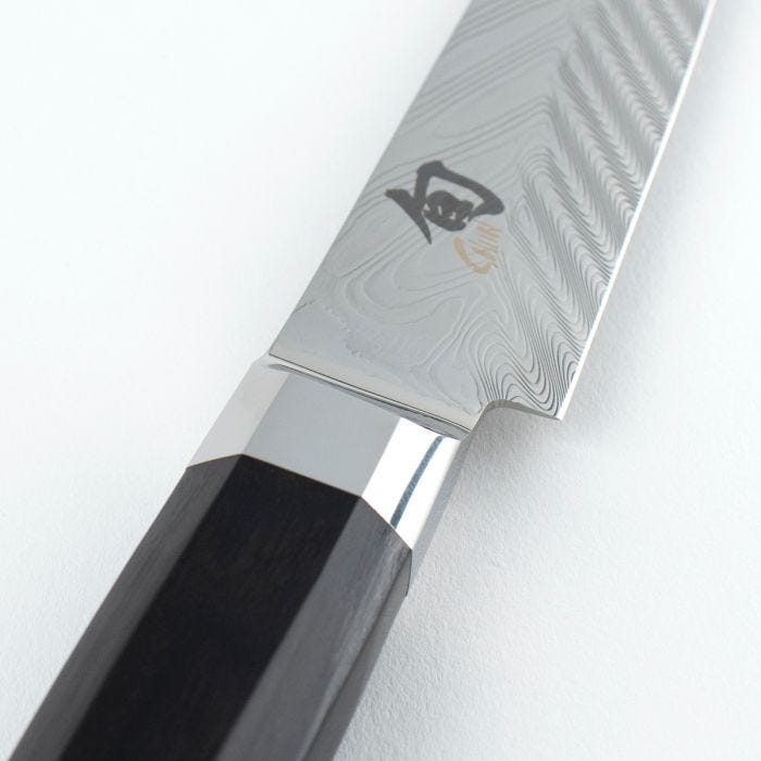 Shun | Dual Core Utility & Butchery, 6 inches, showcases the octagonal wooden handle, polished ferrule, and Damascus-patterned blade with kanji mark, ideal for precise kitchen tasks.