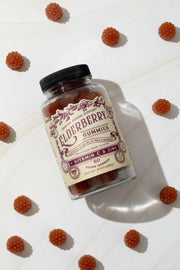 Roots & Leaves Elderberry Gummies in a jar, showcasing specialty food available at Athens Cooks, known for its curated culinary products and expertise.