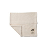 Vejibag | Two Pocket Vejibag: Folded cotton produce bag with two storage pockets, designed to keep herbs like cilantro and parsley fresh, featuring a vejibag label.