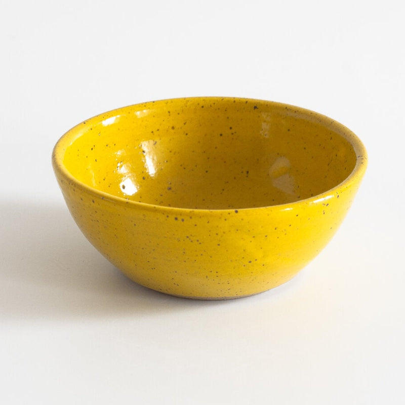 RachaelPots Salt + Sauce Bowl in yellow, hand-thrown stoneware, perfect for holding ingredients, nests with other bowls, microwave and dishwasher safe.