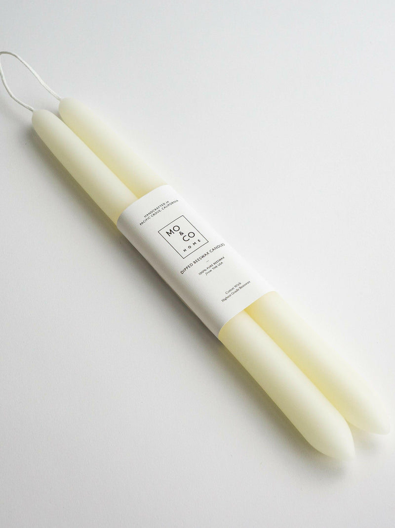 Mo&Co 100% Beeswax Dipped 14 Tapers in Pink Rose, handcrafted in Pacific Grove, ideal for enriching daily moments with a natural honey scent.