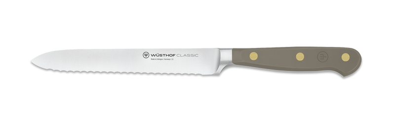 Wüsthof | Classic 5 Serrated Utility Knife, ideal for cutting rolls, vegetables, and fruit, featuring a fine serrated edge and resilient synthetic riveted handle.