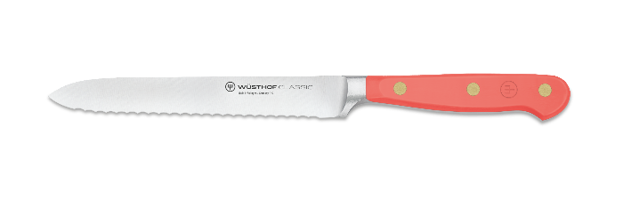 Wüsthof Classic 5 Serrated Utility - Velvet Oyster knife with red handle, ideal for cutting rolls, vegetables, and fruits; essential for sandwich preparation and brunch settings.