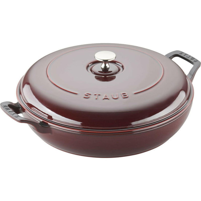 Staub 12 inch Cast Iron Braiser with Lid, ideal for versatile cooking, featuring vintage-style handles and a domed lid for enhanced flavor retention.