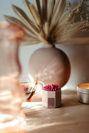 Tenn Prairie Match Holder with Striker and Matches, featuring a hand-poured concrete design with cork bottom, shown close-up on a table.