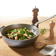 de Buyer | Mineral B Carbon Steel Country Fry Pan - 12.5 with high sides, ideal for versatile cooking methods, crafted from carbon steel for natural non-stick performance.
