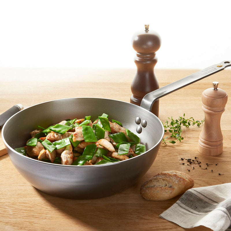 de Buyer | Mineral B Carbon Steel Country Fry Pan - 12.5 with high sides, ideal for versatile cooking methods, crafted from carbon steel for natural non-stick performance.