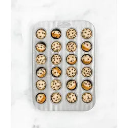 USA Pan | Muffin Pans - 12 Cup Muffin Pan & Lid Set, featuring 24-cavity commercial-grade aluminized steel for even baking and nonstick coating for easy release.