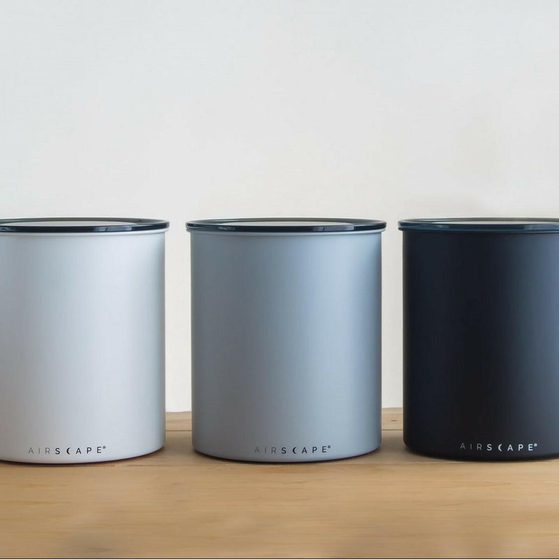 Planetary Design | Airscape Canisters - Ash - Matte Gray - Large: Stainless steel container designed to preserve freshness, featuring a clear lid and inner swooshing lid for airtight storage.