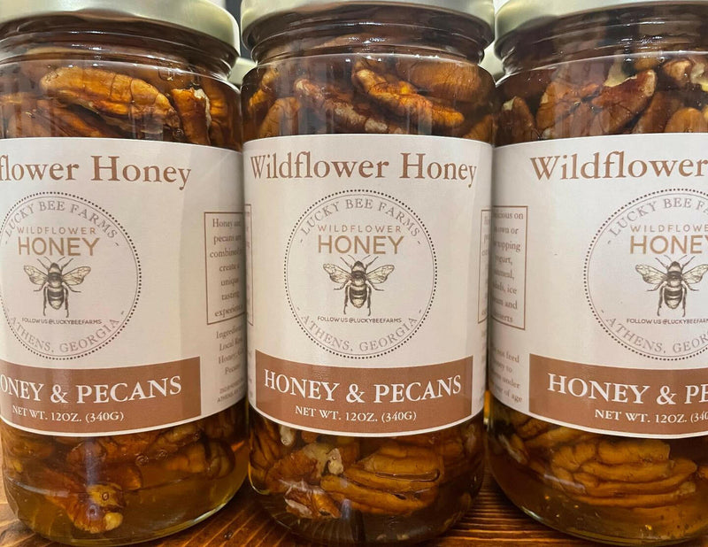 Lucky Bee Farms Honeycomb Jar, showcasing raw, unfiltered honey from Athens, GA, encapsulated in a mason jar, highlighting natural sweetness from local wildflowers.