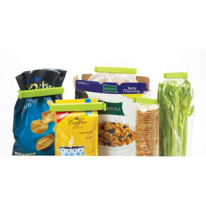 Twixit! Bag Clips - Set of 8 shown sealing a plastic bag, ideal for keeping various foods fresh, reducing waste, and organizing storage efficiently.