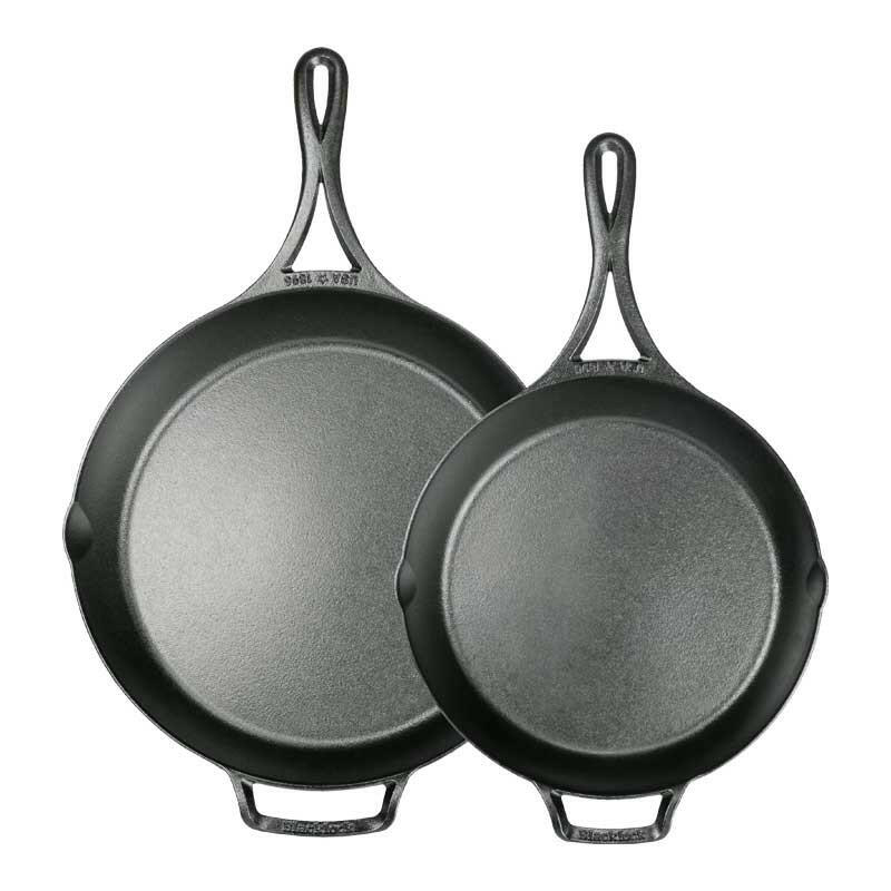 Lodge | Blacklock Skillets - Set of 2 | 10.25 & 12 - close-up of versatile, lightweight, triple seasoned cast-iron skillets with handles, ideal for diverse cooking needs.