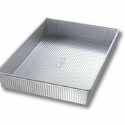 USA Pan | Cake Pans - 12 in Round, featuring FDA-approved Americoat® nonstick coating and ridged texture for effortless release and even baking. Ideal for all bakers.