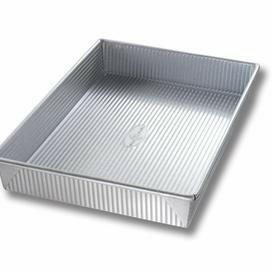 USA Pan | Cake Pans - 12 in Round, featuring FDA-approved Americoat® nonstick coating and ridged texture for effortless release and even baking. Ideal for all bakers.