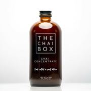 The Chai Box | Chai Concentrate - Unsweetened in a brown bottle with white text, ideal for quick, homemade chai with organic Assam tea and spices.