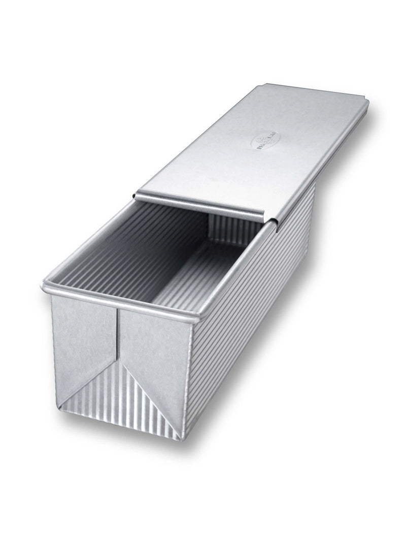 USA Pan Pullman Loaf Pan with Cover, large size, features a ridged texture and Americoat® nonstick coating for easy bread release and cleanup.