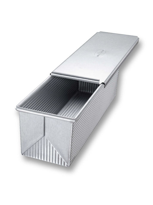 USA Pan Pullman Loaf Pan with Cover, large size, features a ridged texture and Americoat® nonstick coating for easy bread release and cleanup.
