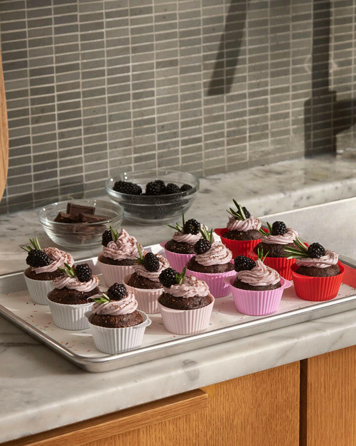 GIR | Cupcake Liners - Confetti: Durable, reusable silicone liners designed for perfect cupcake baking, featuring fill lines and handles for easy use. Ideal for air fryers and organizing snacks.