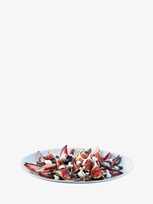 LSA International Dine Oval Platter - 16.5 features a sleek, oval porcelain design with low curved walls, ideal for serving various dishes elegantly.