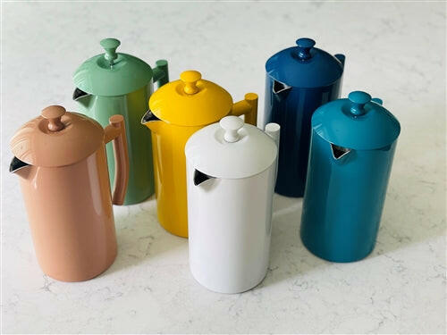 Frieling Double-Walled French Press in Sunshine Yellow, a stylish coffee maker with an efficient filter system for rich brews, perfect for enhancing any kitchen decor.