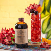 El Guapo Craft Cocktail Mixer - Salted Paloma displayed in a bottle, ideal for quick, premium cocktails or zero-proof drinks with high-quality ingredients.