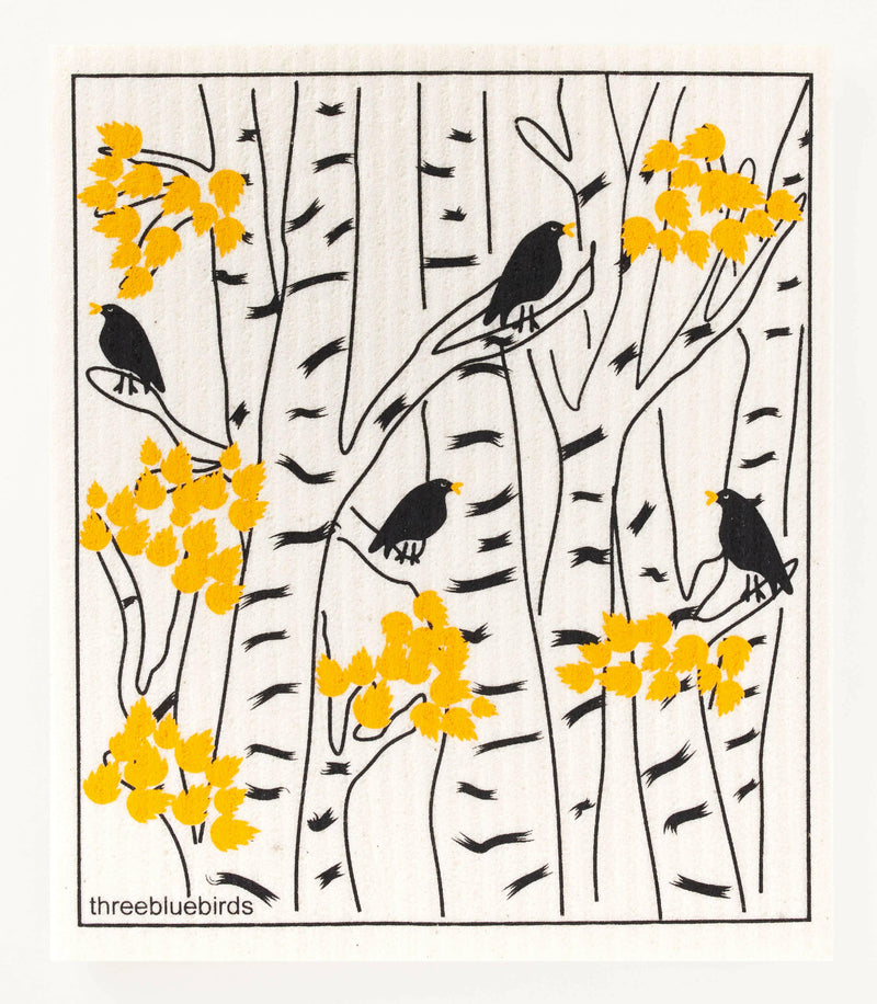 Three Bluebirds Swedish Dishcloth with a black bird design, ideal for sustainable kitchen cleaning, absorbing 20 times its weight, biodegradable, and reusable.