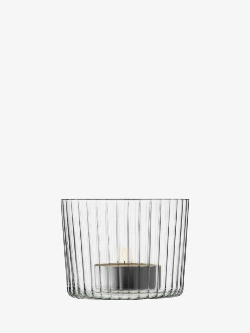 LSA International GIO Tealight Holder set of 4, featuring stylish linear texture, stackable design, and versatility as tumblers or dessert dishes, includes four votive candles.